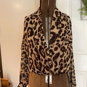 Semi-sheer leopard print great for any season.